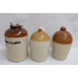 Three Large Stoneware Advertising Jars