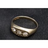9CT Gold Ring Set with 3 Clear Stones which do not test as diamond. Over all weight 3.2grams