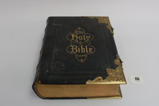 An 1890 Leather and Brass Bible with an abridgement of the commentaries of Scott & Henry. All - Image 1 of 8