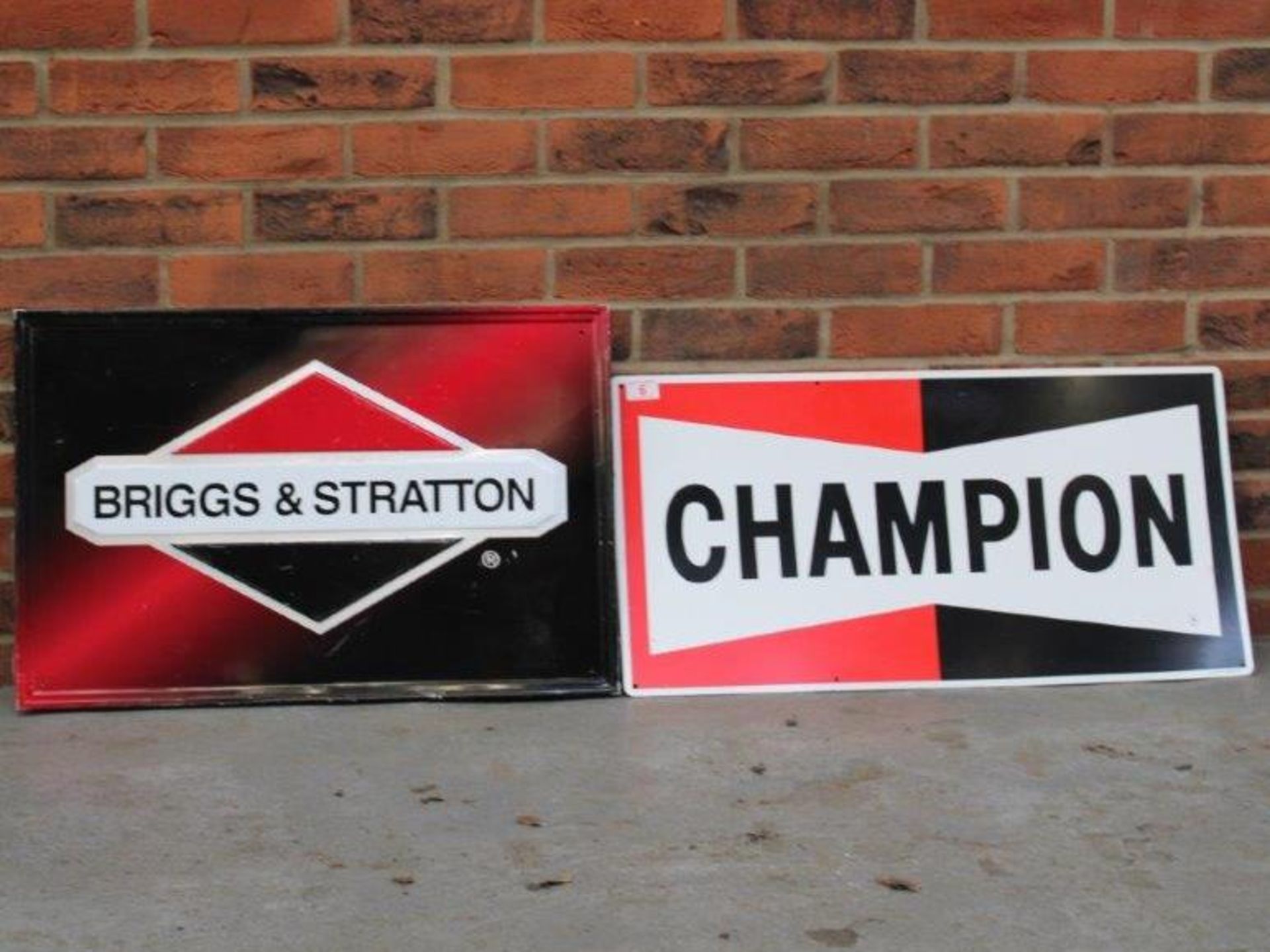 Briggs & Stratton Pressed Metal Sign Together With Champion Spark Plugs Sign