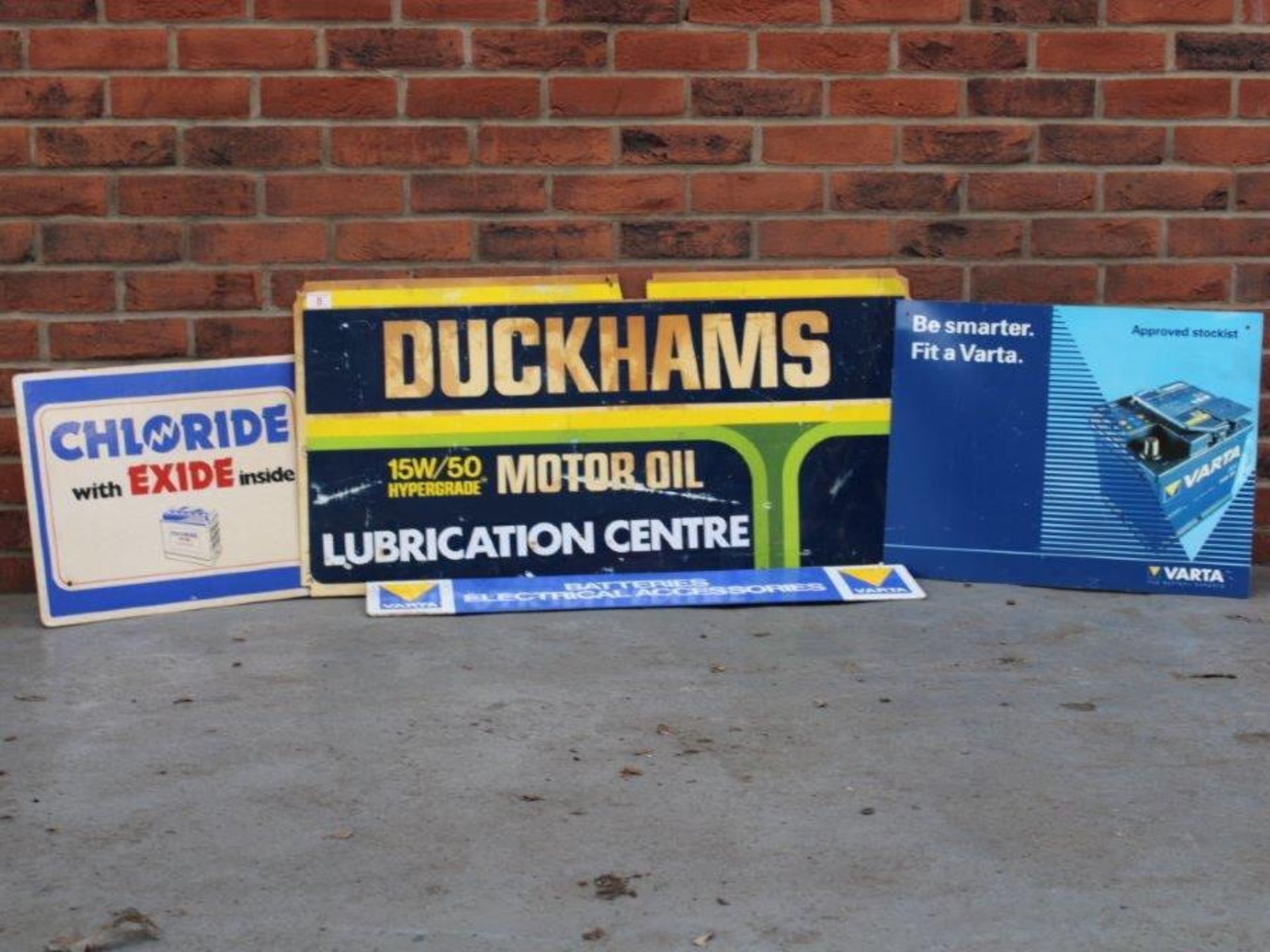 Two Varta Batteries Signs, Chloride With Exide Sign And Duckhams Motor Oil Sign