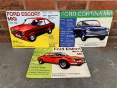 Three Modern Tin Ford Escort Signs