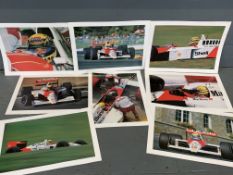 Eight Unframed Ayrton Senna Photographs