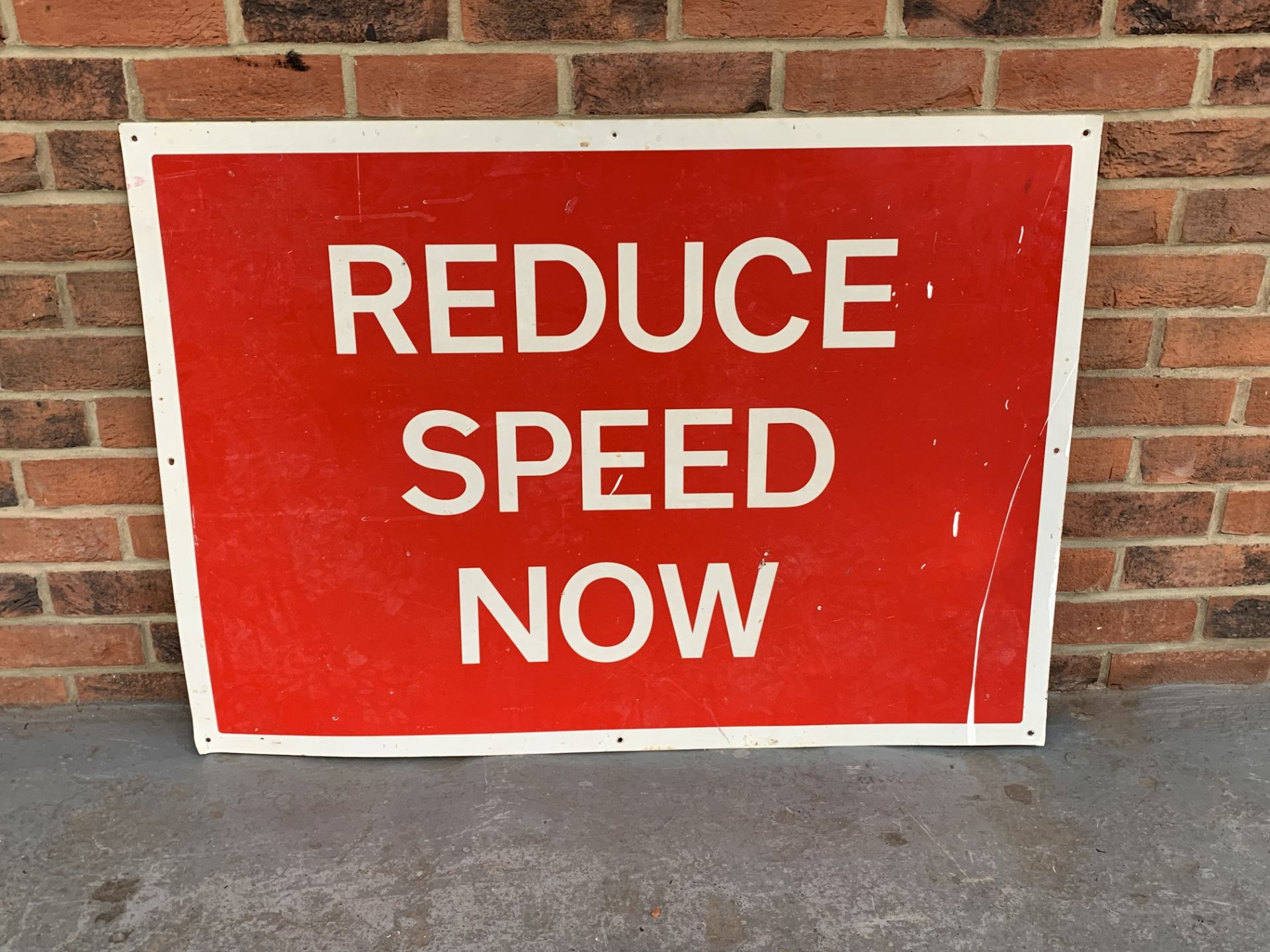 Reduce Speed Now Road Sign