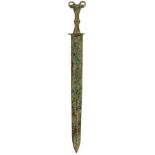 A WARRING STATES HAN DYNASTY BRONZE SWORD, 47.5cm tapering blade with raised medial ridge, the