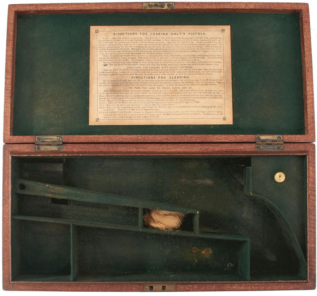 AN AMERICAN COLT NAVY CASE, the mahogany case with green baize lined interior, the lid with