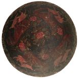 A 19TH CENTURY LACQUERED HIDE DHAL OR SHIELD BLANK, 44.5cm diameter, the convex body decorated