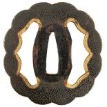 A LOBED SHAKUDO TSUBA, the stippled plate with large gold lined shaped kitsu-ana and gilt rim, in
