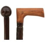 A 19TH/20TH CENTURY SOUTH AFRICAN ZULU HARDWOOD WALKING CANE, probably lignum vitae, with ball