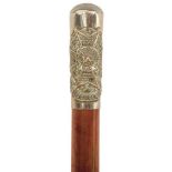 A BORDER REGIMENT SWAGGER STICK, white metal top with 70cm haft, together with a further example