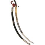 A GEORGIAN FLANK OFFICER'S SWORD, 77cm sharply curved blade decorated with scrolling foliage, stands