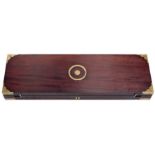 A 19TH CENTURY MAHOGANY GUN CASE, the relined red baize interior for a gun with 30inch barrels,