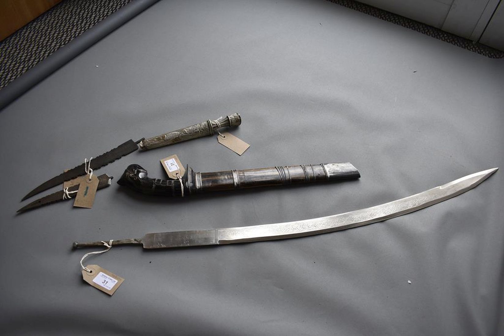 A LATE 19TH CENTURY TIBETAN DAGGER, 13cm fullered blade, characteristic white metal hilt and - Image 2 of 11
