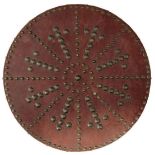 A 19TH CENTURY SCOTTISH TARGE OR SHIELD, 46cm diameter leather covered body with domed brass rivet