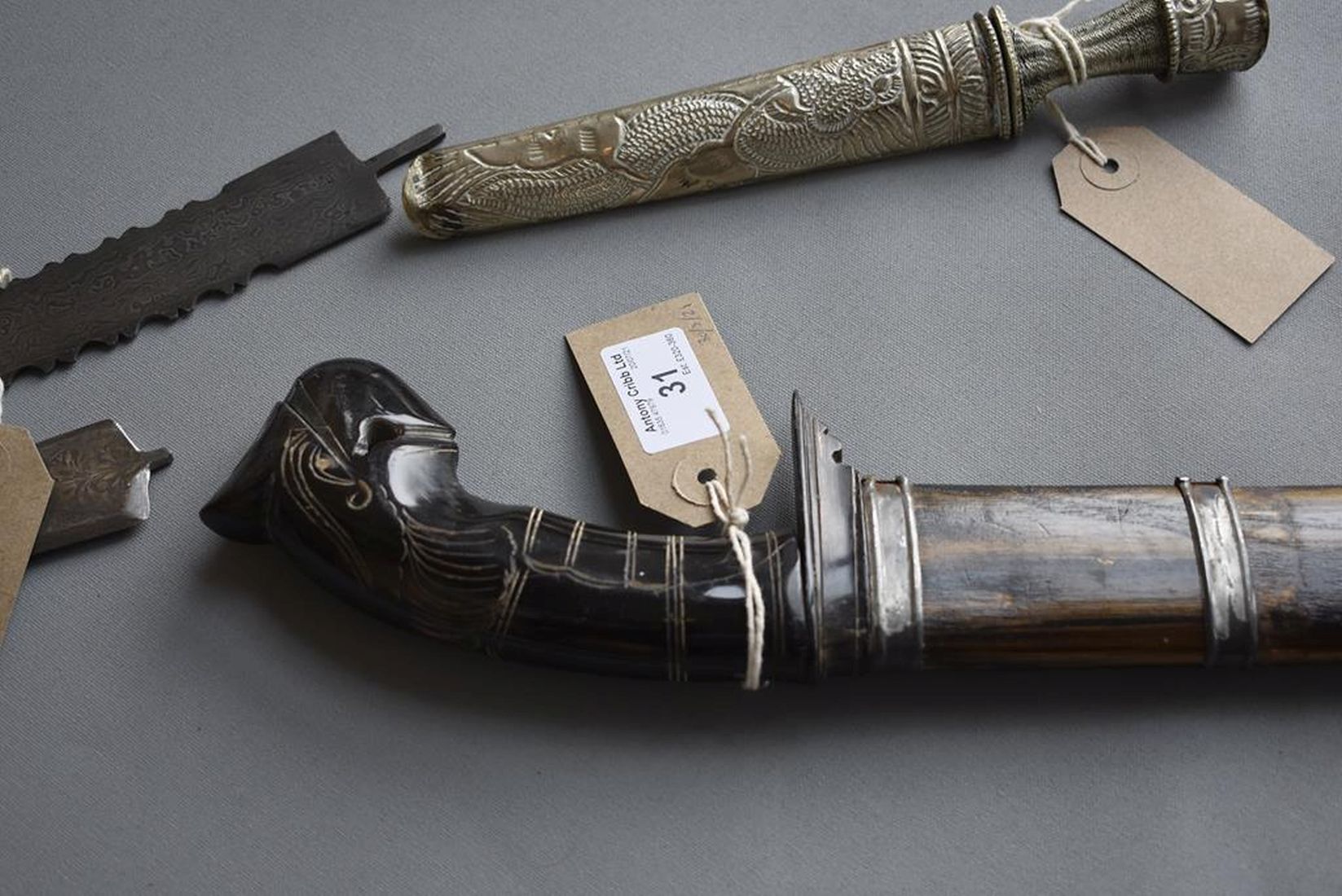 A LATE 19TH CENTURY TIBETAN DAGGER, 13cm fullered blade, characteristic white metal hilt and - Image 5 of 11