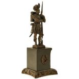 A VICTORIAN BRONZE DESK STATUE OF A SUTHERLAND HIGHLANDERS SOLDIER, 20cm over all height, the bronze