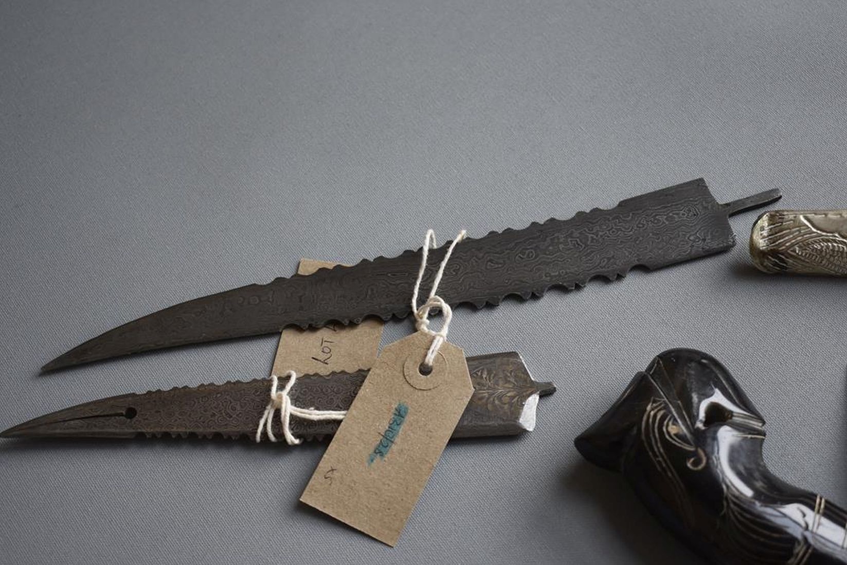 A LATE 19TH CENTURY TIBETAN DAGGER, 13cm fullered blade, characteristic white metal hilt and - Image 4 of 11