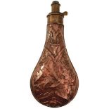 A LARGE SIZE EMBOSSED COPPER POWDER FLASK, decorated over all with oak leaves and stags' heads,