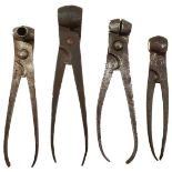 FOUR SCISSOR BULLET MOULDS, all stamped WD. (4)