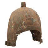 A CHINESE BRONZE ZHOU DYNASTY STYLE HELMET, of characteristic domed form with radiating ribs and