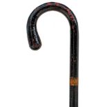 AN UNUSUAL AND HEAVY 19TH CENTURY CAST IRON WALKING STICK, of traditional form with crook handle,