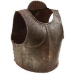 A 17TH CENTURY INDIAN CUIRASS OR ARMOUR, the anatomically formed breast plate with raised medial