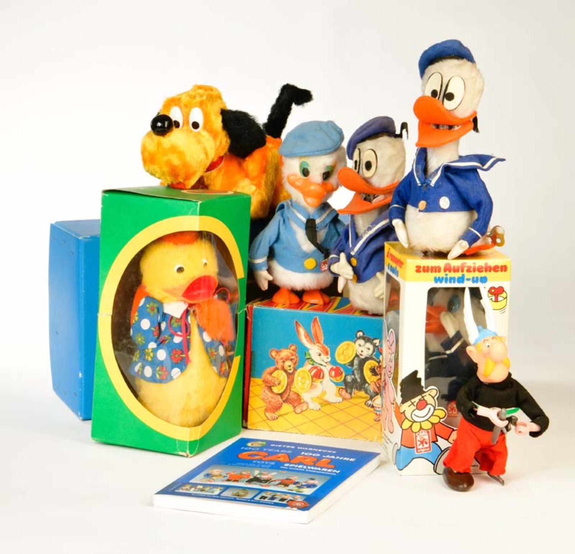 Carl, 4x Donald Duck, Pluto, Ente, Asterix + 1 Buch