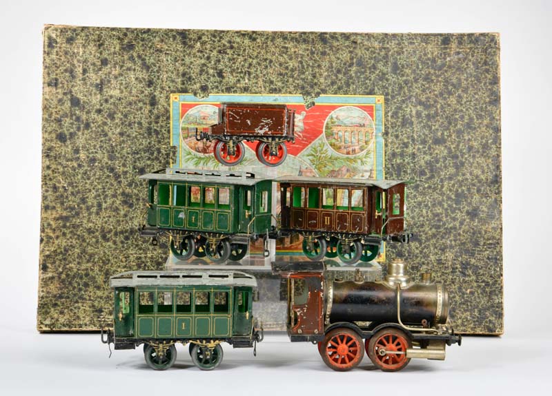 Carette, wooden box with loco + passenger car, Germany pw, gauge 1, tin, paint d., around 1896,