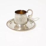 Russian silver cup and saucer.