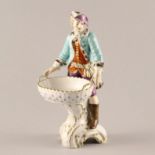 Porcelain figurine-candy bowl. KPM.