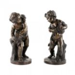 Pair of bronze figures of Putti.