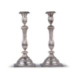 A pair of slender silver candlesticks. Russia, 19th century.