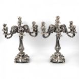 A pair of silver candlesticks. Vercelli 19/20 century.