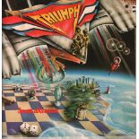 Schallplatte. Triumph. Just a game. Langspielplatte. PL – 13224. Amsterdam, RCA Records, ca. 1979.