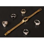 Damenarmbanduhr, Marke „Dugena“, und fünf Damenringe. Silber, ca. 20 g, bzw. vergoldet, Ringgröße