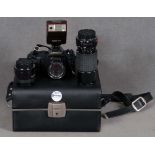 Spiegelreflexkamera „Canon T50“, mit zwei Canon-Objektiven und einem Sigma-Objektiv sowie einem