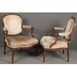 Paar Louis XVI-Fauteuilles. Deutsch um 1780-90. Massiv Nussbaum, teilw. geschnitzt. (besch.) **