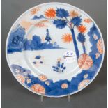 Teller. China Regierungsperiode Kangxi (1662–1722). Porzellan, unterglasurblau und eisenrot