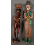 Zwei Figuren. Afrika / Asien. Massivholz, geschnitzt, teilw. bemalt, H=118 / 133 cm. **