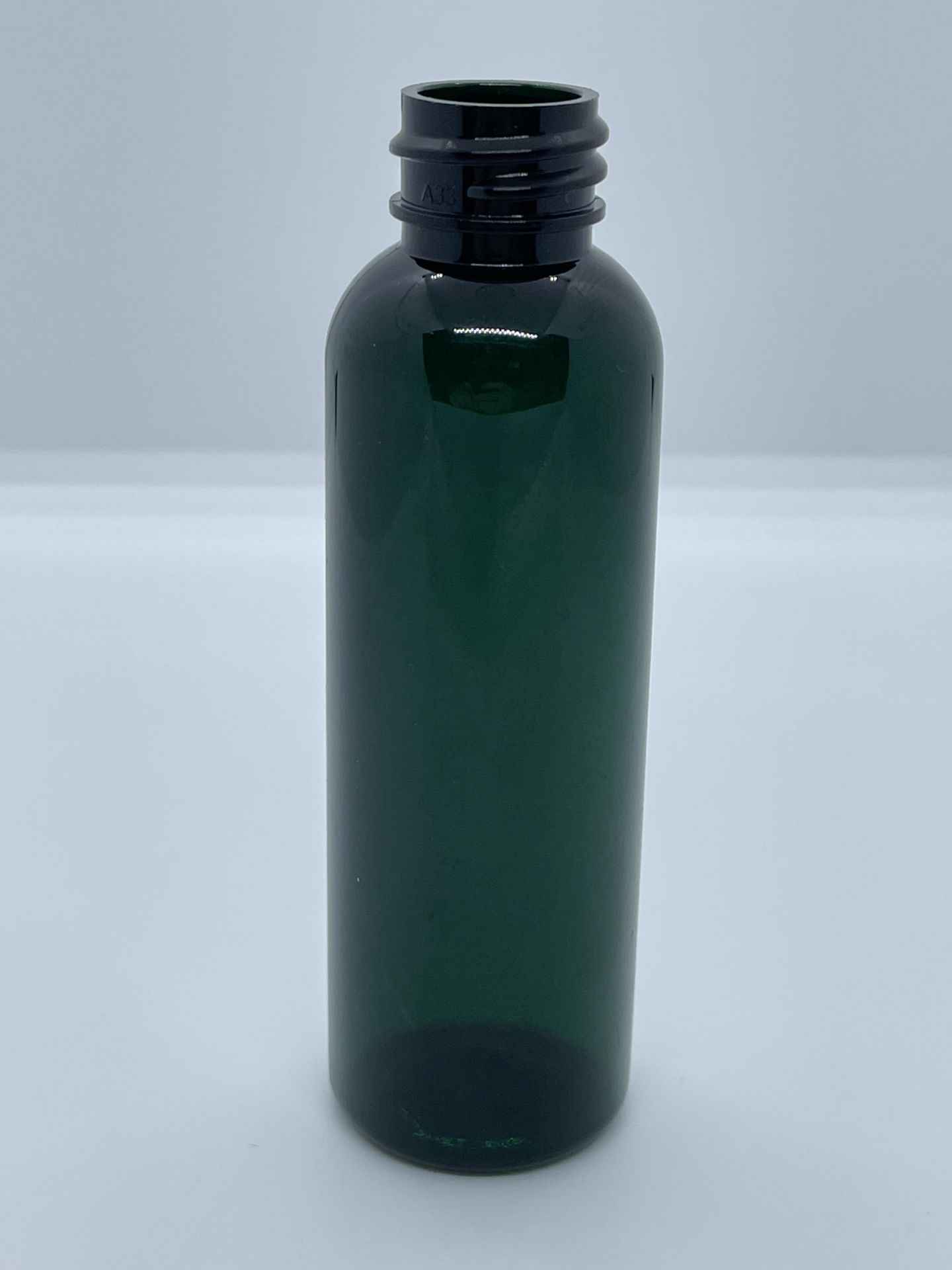 29,000 - Green Alpha Plastic 2 oz Empty Bottles, 20-410 Threading Neck, 4 1/8" Tall, 1.25" Diameter