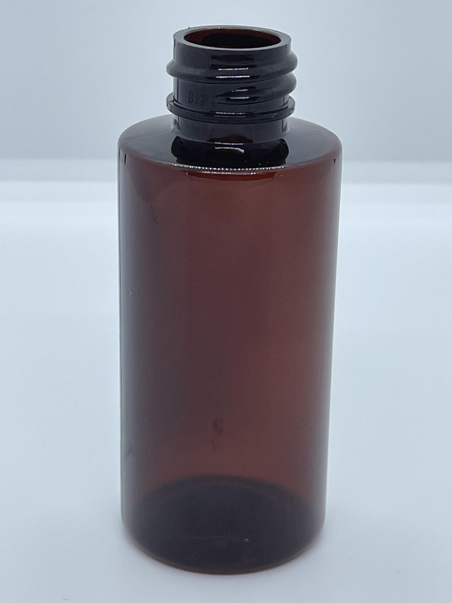 32,000 - Amber Cylinder Plastic 2 oz Empty Bottles, 20-410 Threading Neck, 2.25" Tall x 1 3/8"
