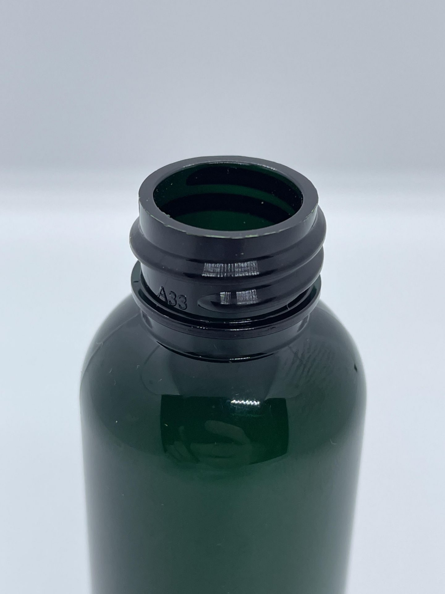 29,000 - Green Alpha Plastic 2 oz Empty Bottles, 20-410 Threading Neck, 4 1/8" Tall, 1.25" Diameter - Image 3 of 4