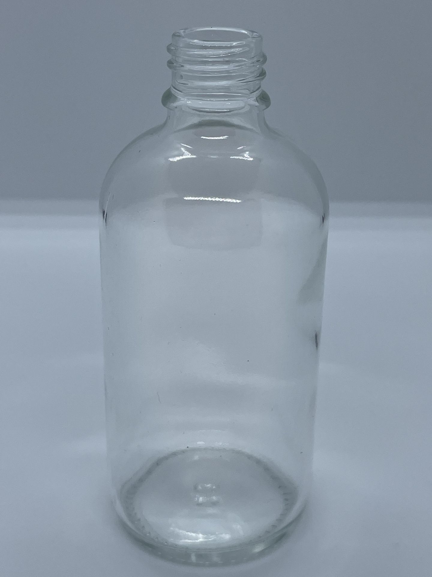 20,000 - Clear Glass 4 oz Empty Bottles, 20-410 Threading Neck, 4.5" Tall, 1 7/8" Diameter