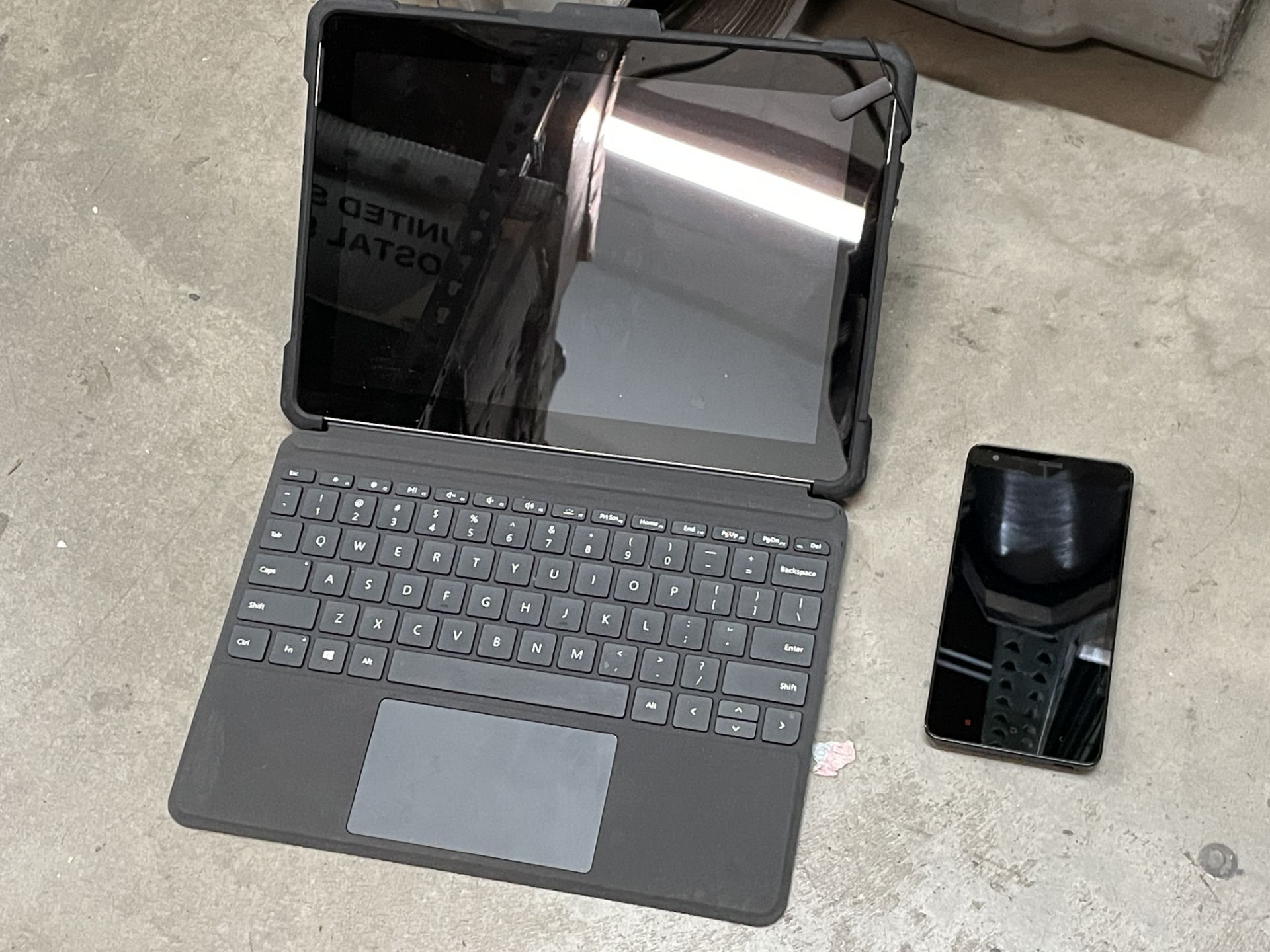 POS Tablet with keyboard and card reader attachment AND MI 4G Cellular Phone