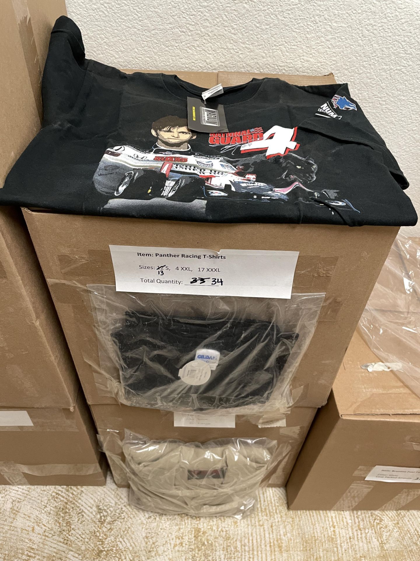 44 Piece - Mixed Clothing Lot: 34 Panther racing T-Shirts various sizes, 10 DriFire Tactical Shirts