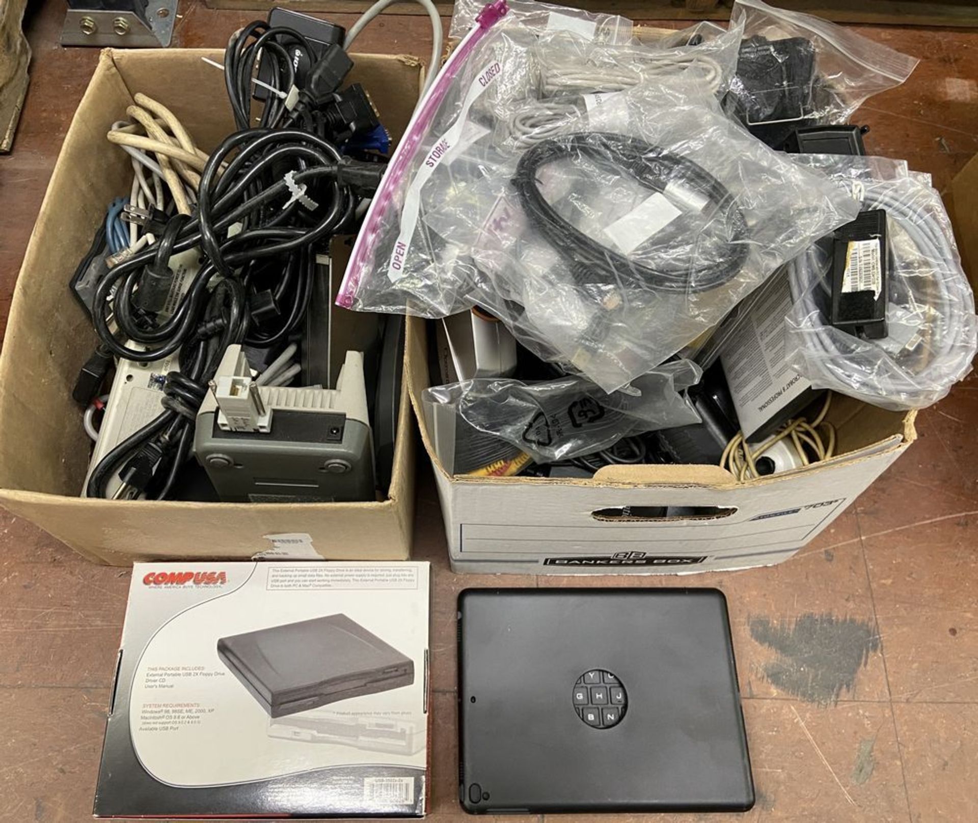 Mixed Lot of Retail Electronics including: Comp USA Floppy drive, Tablet Keyboard Case, Misc