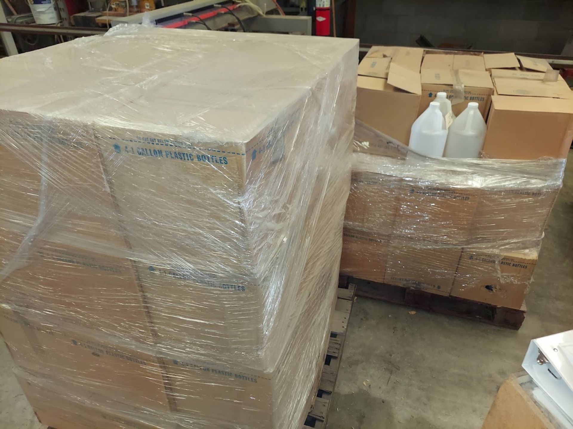2 - Pallets of New 1 Gallon Plastic Bottles with Lids