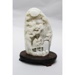White Jade sculpture, curved on wooden base , Qing Dynasty. 20 cm height