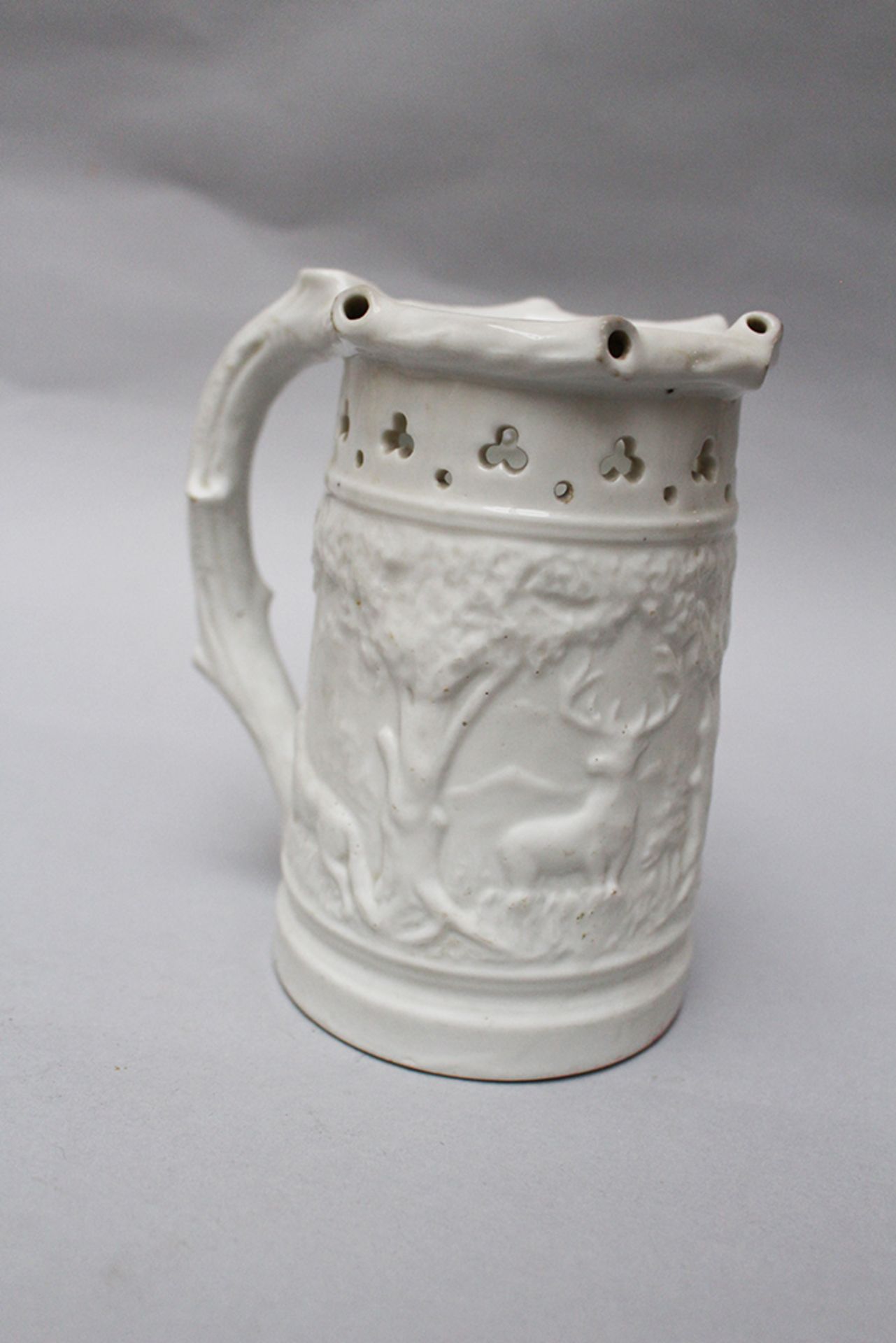 Porcelain beaker , decorated white glazed 19th Century. 15 cm height