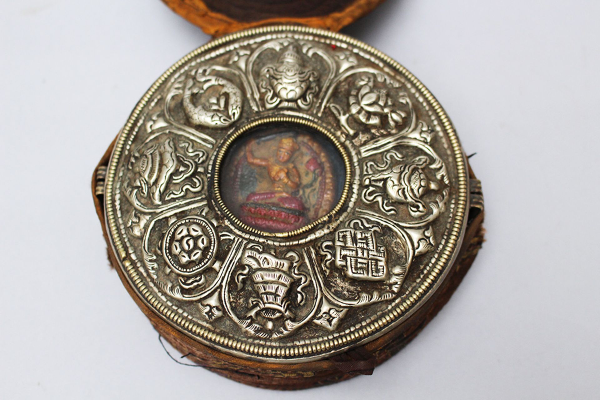 Tibet Pilgrim , Sanctuary, metal glass and textile decorated 19 th Century. 13 cm diameter